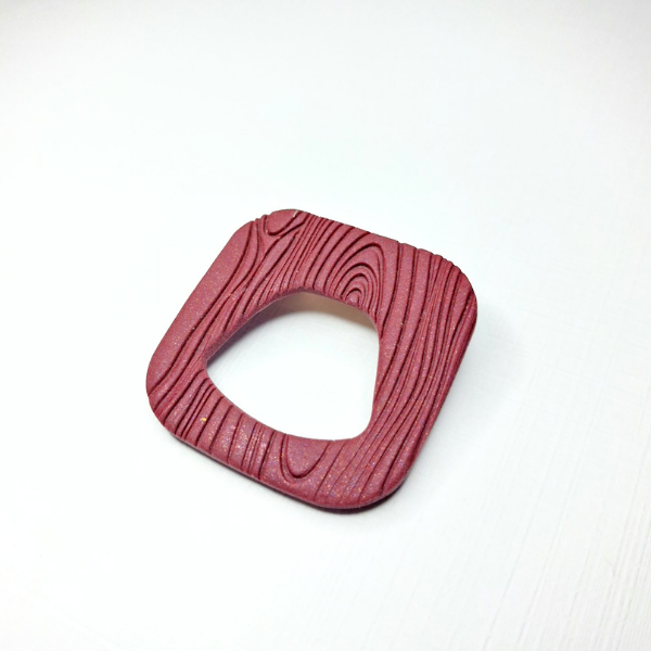 Broche à lunettes bordeaux
