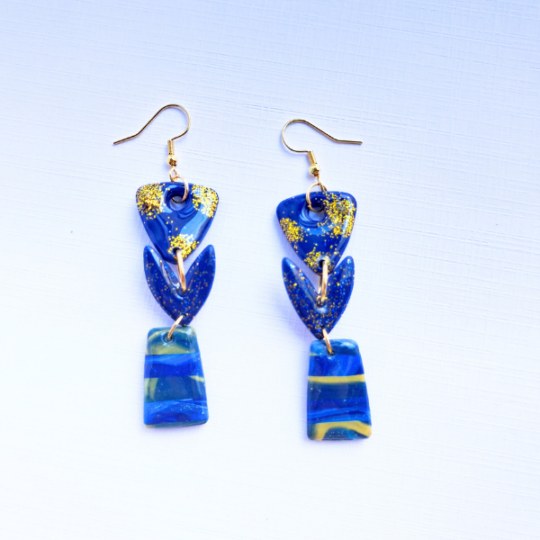 boucles oreilles pate fimo argile polymere resine uv fait main piece unique jadoretesboucles j'adore tes boucles jtb acier inoxydable vendée créatrice française made in France bleu orange citrouille halloween automne paillettes or soleil blanc